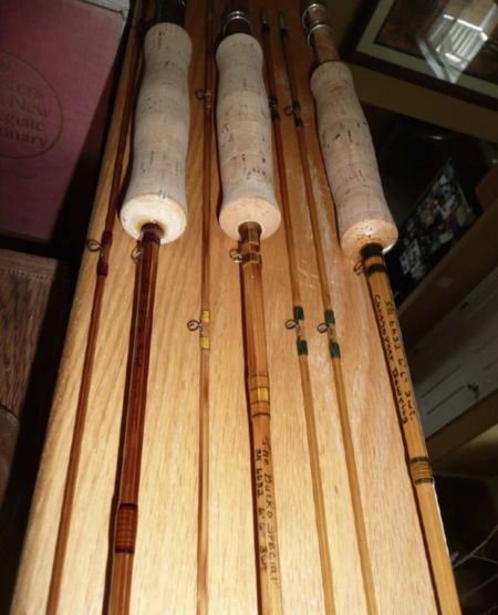 Vintage fishing rods in display rack